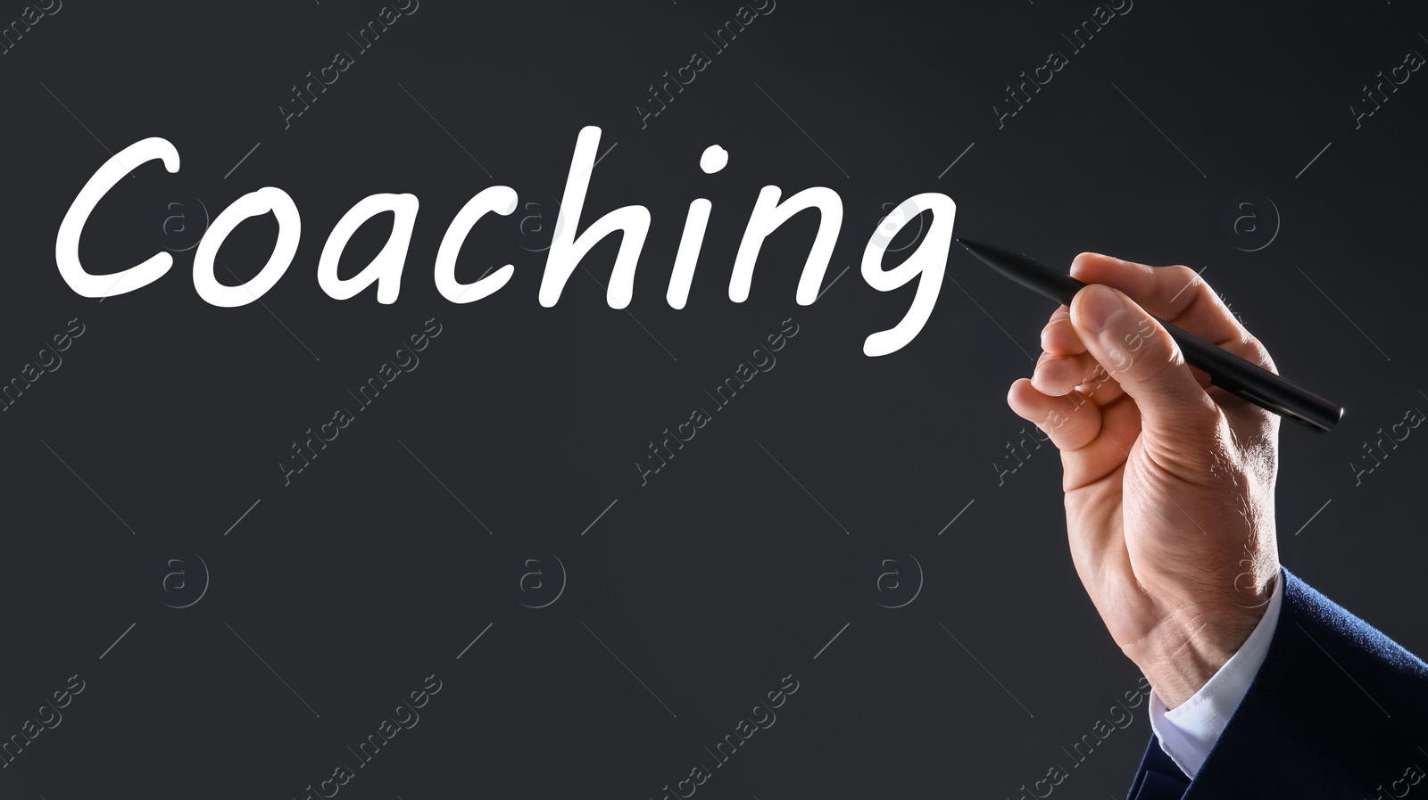 Image of Business trainer writing word Coaching on virtual screen, closeup. Banner design