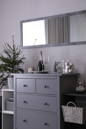 Photo of Beautiful room interior decorated for Christmas with potted fir