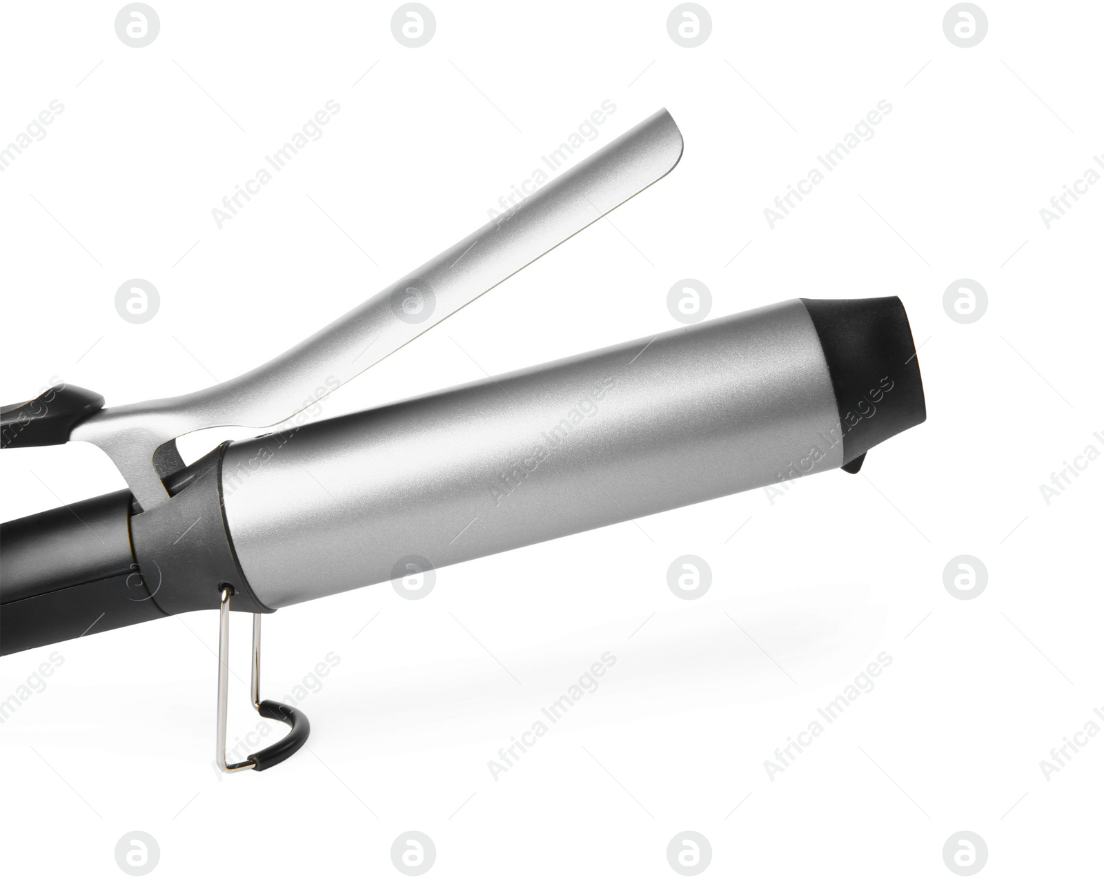 Photo of Hair styling appliance. One curling iron isolated on white