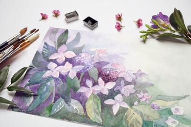 Beautiful floral picture, brushes and watercolor paints on white background