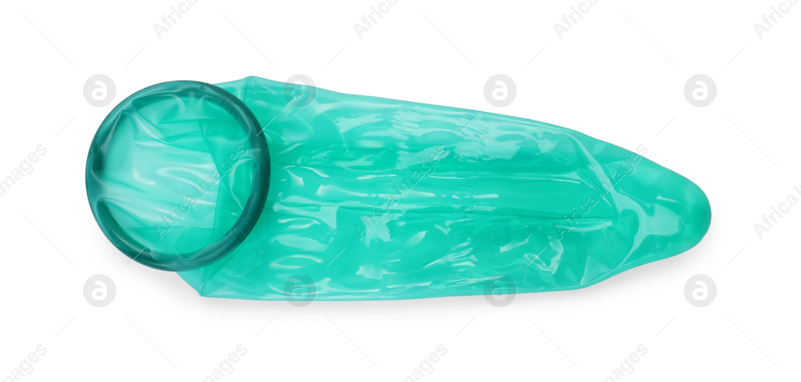 Photo of Unrolled condom on white background, top view. Safe sex