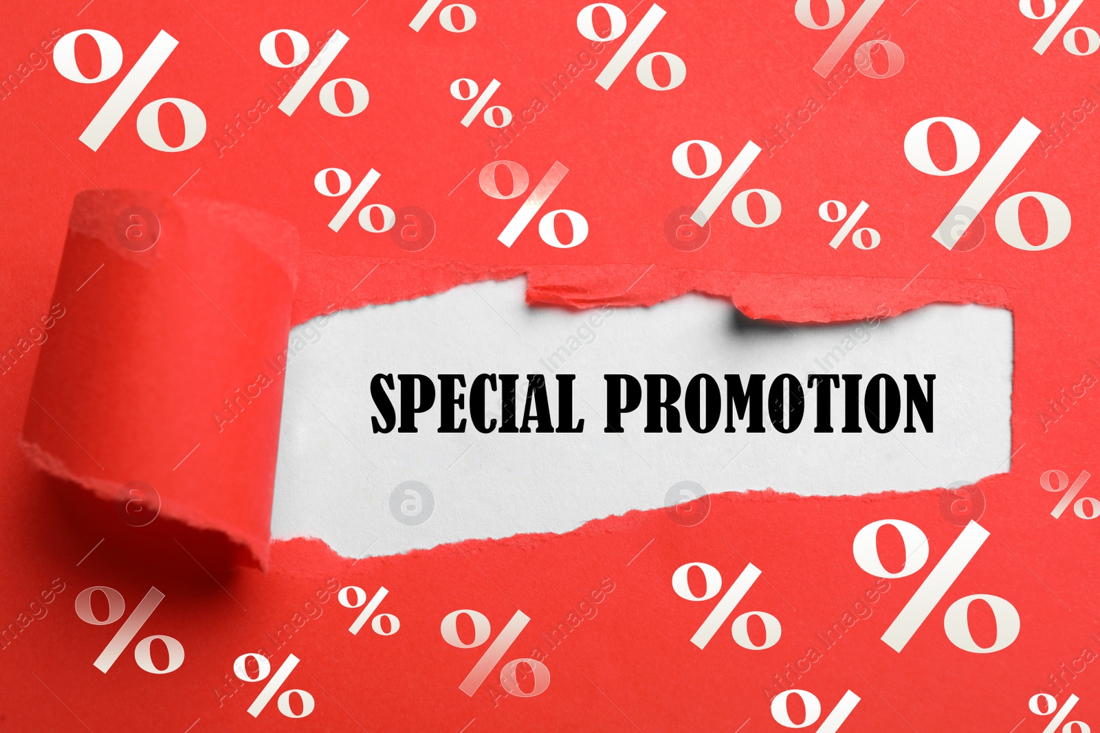 Image of Phrase Special Promotion on white background through hole in red paper, top view
