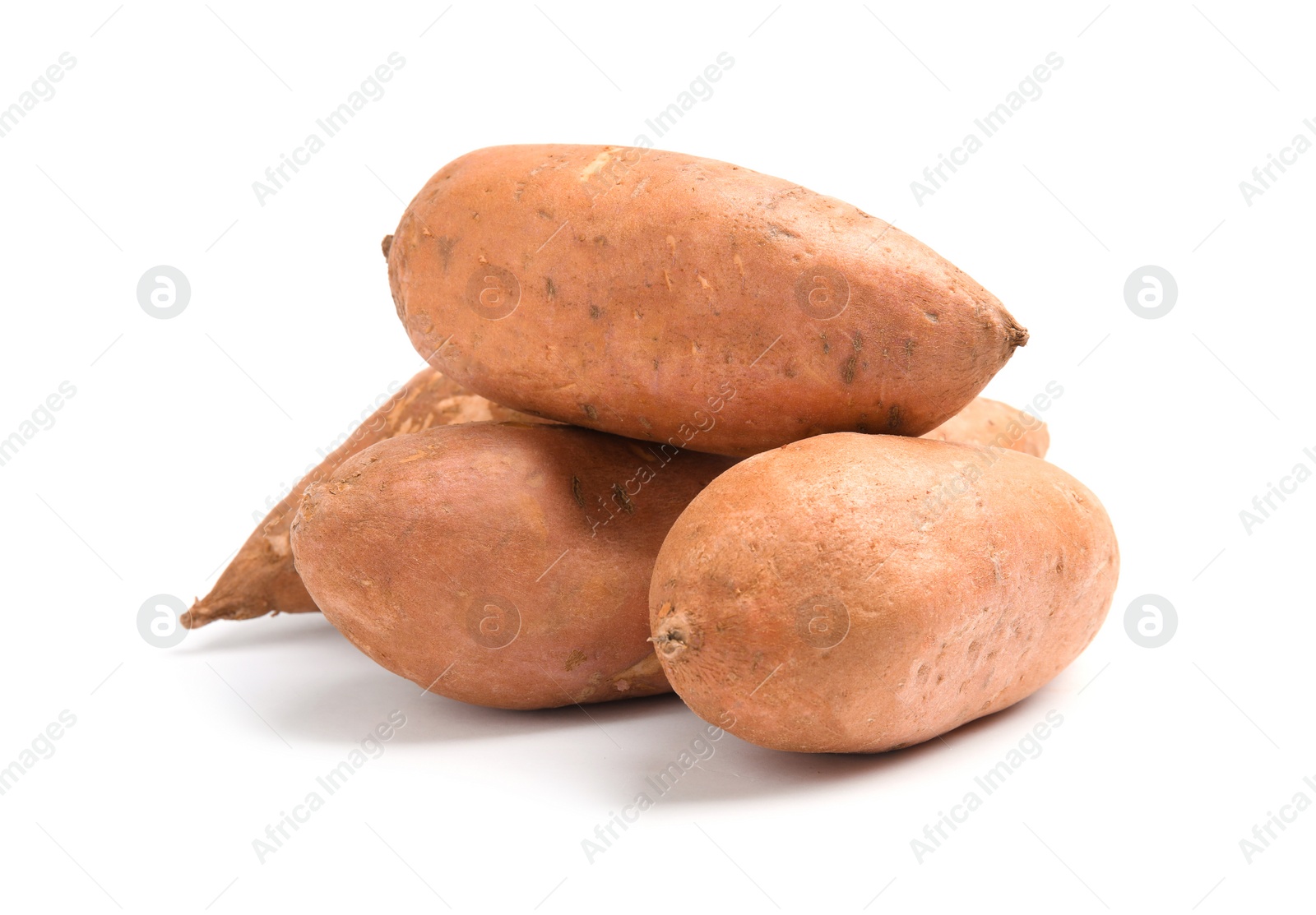 Photo of Whole ripe sweet potatoes on white background