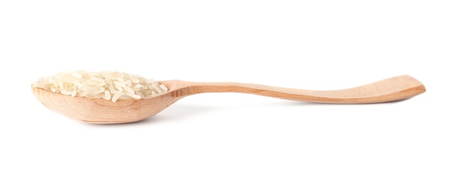 Photo of Spoon with uncooked brown rice on white background