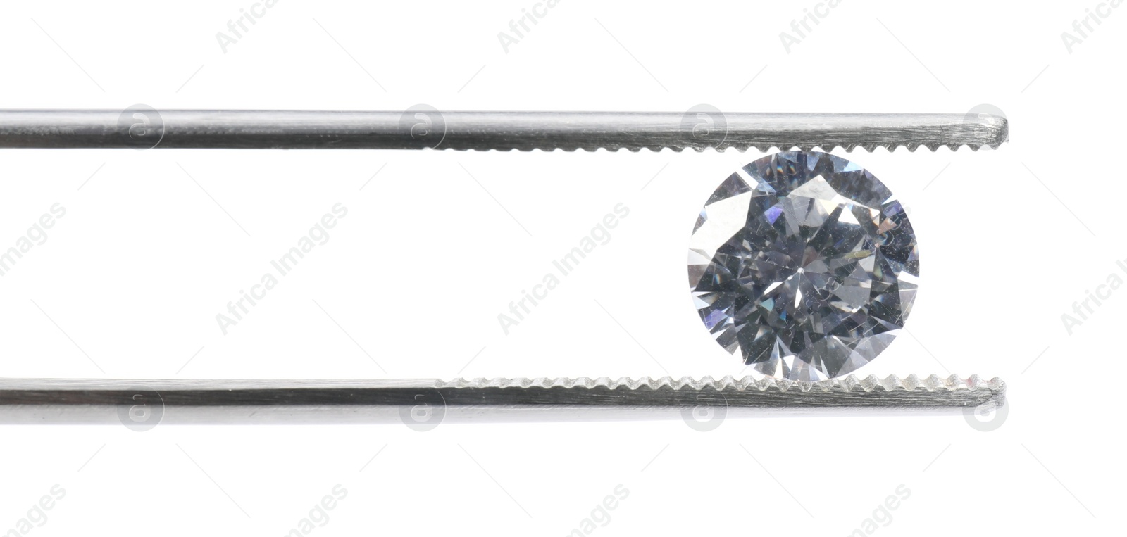 Photo of Tweezers with beautiful shiny diamond isolated on white