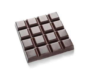 Tasty dark chocolate bar on white background