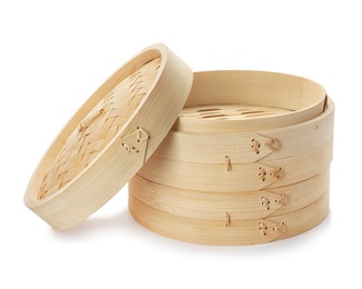 Photo of Steamer set made of bamboo on white background