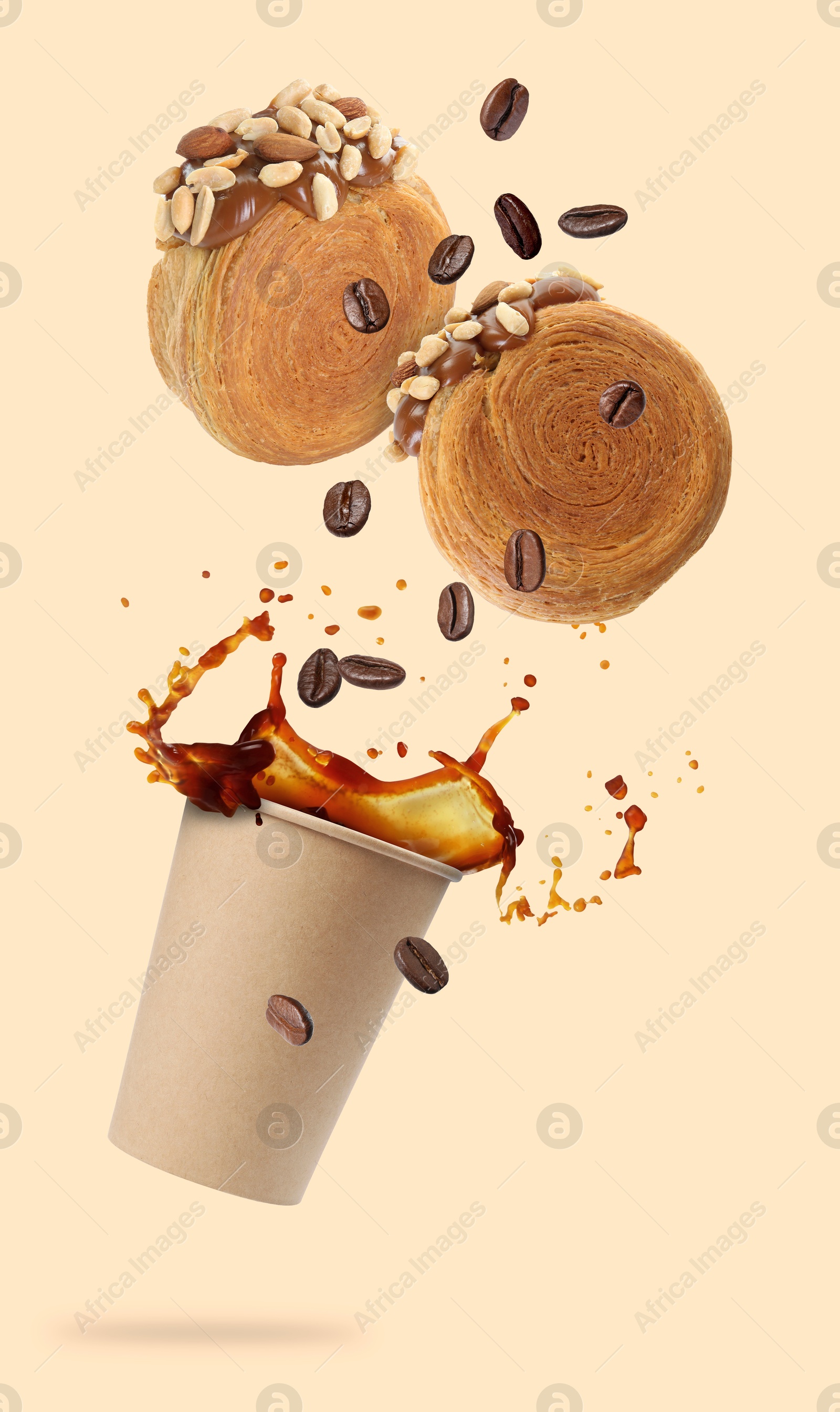 Image of Round croissants and coffee in air on beige background