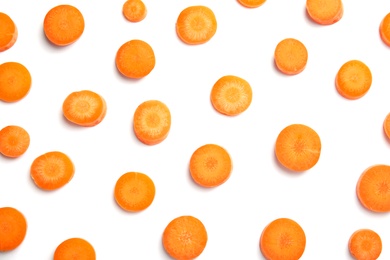 Photo of Sliced ripe carrot on white background