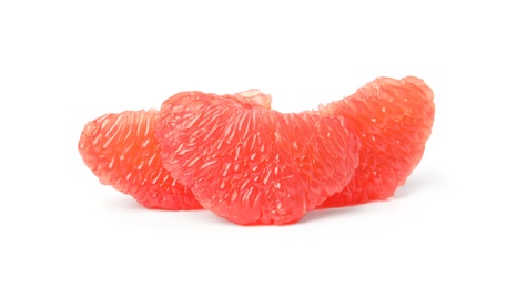 Slices of ripe juicy grapefruit on white background