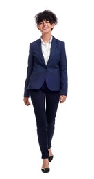 Photo of Beautiful businesswoman in suit walking on white background