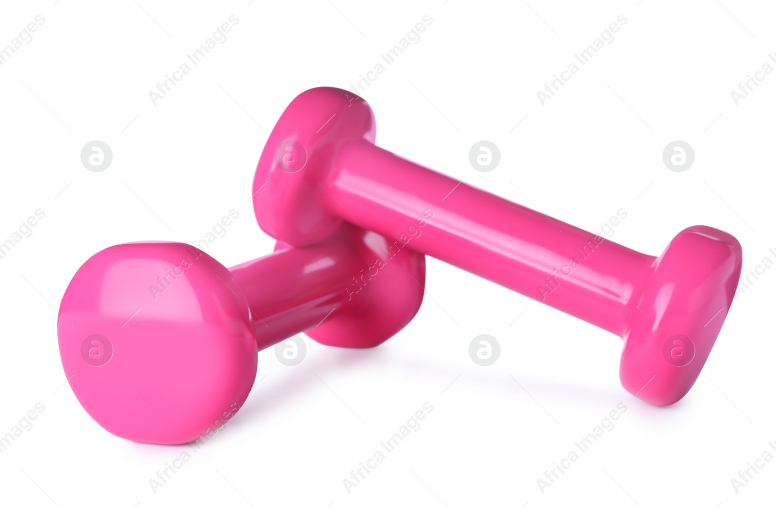 Photo of Color dumbbells on white background. Home fitness