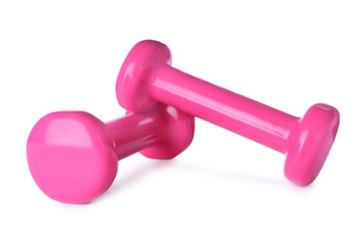Color dumbbells on white background. Home fitness