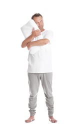 Man holding soft pillow on white background