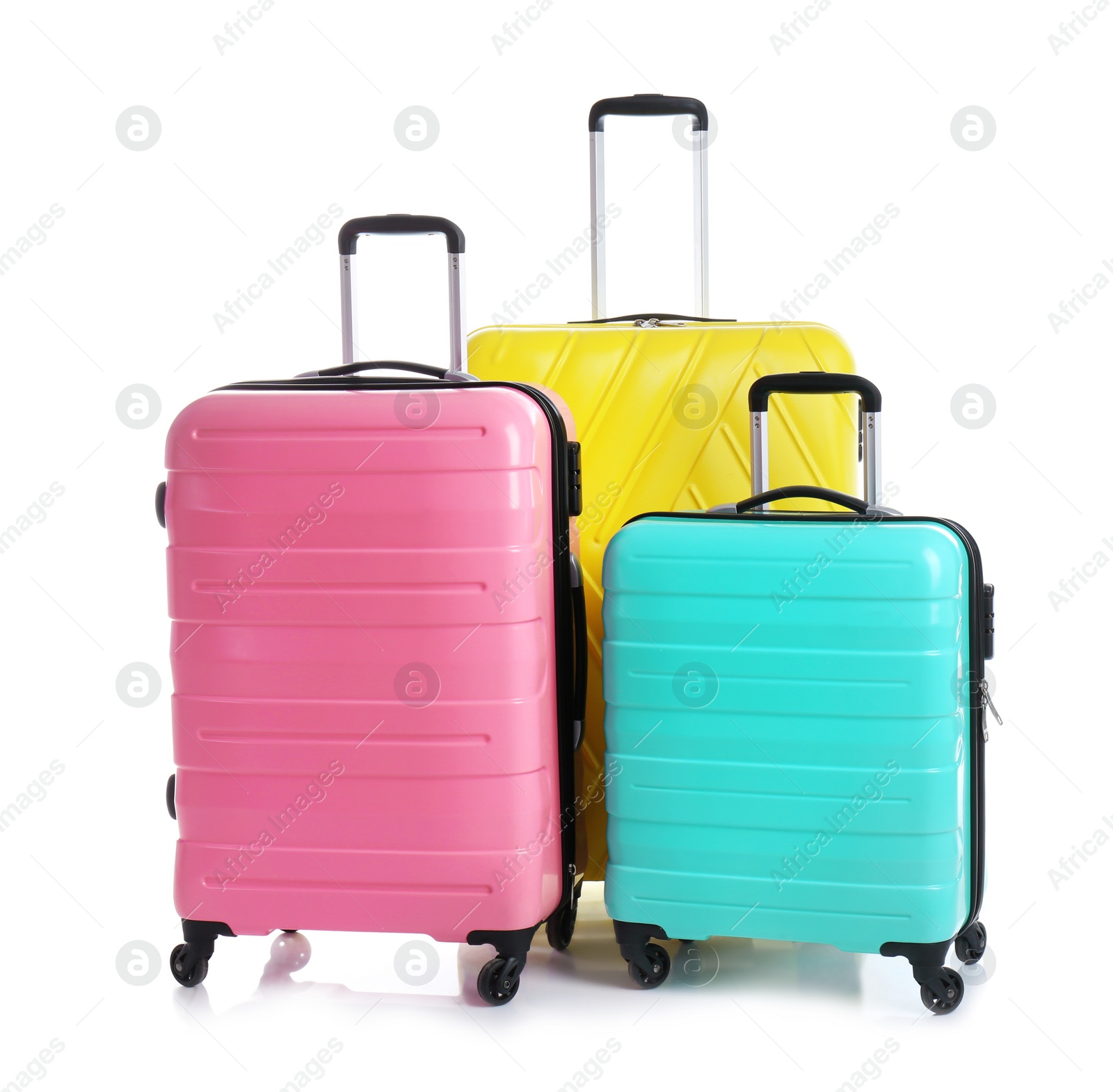 Photo of Modern suitcases for travelling on white background