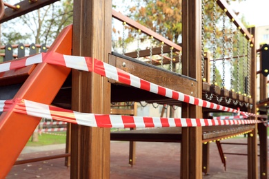 Photo of Empty children's playground closed during COVID-19 quarantine, closeup