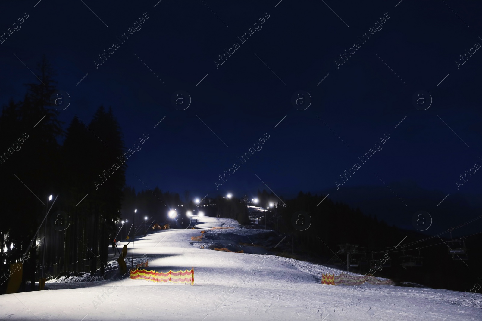 Photo of Beautiful landscape with ski track at night. Winter vacation