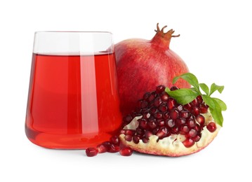 Photo of Refreshing pomegranate juice in glass, leaves and fruit isolated on white