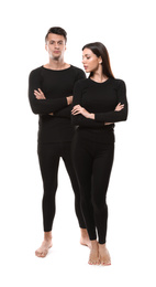 Photo of Couple wearing thermal underwear isolated on white