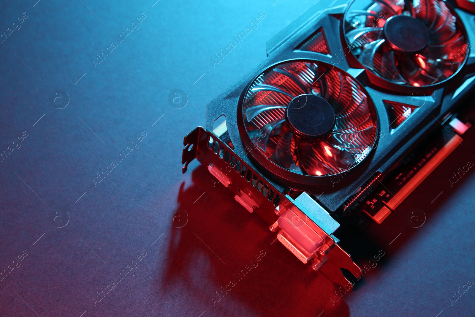 Photo of Computer graphics card on color background, closeup. Space for text
