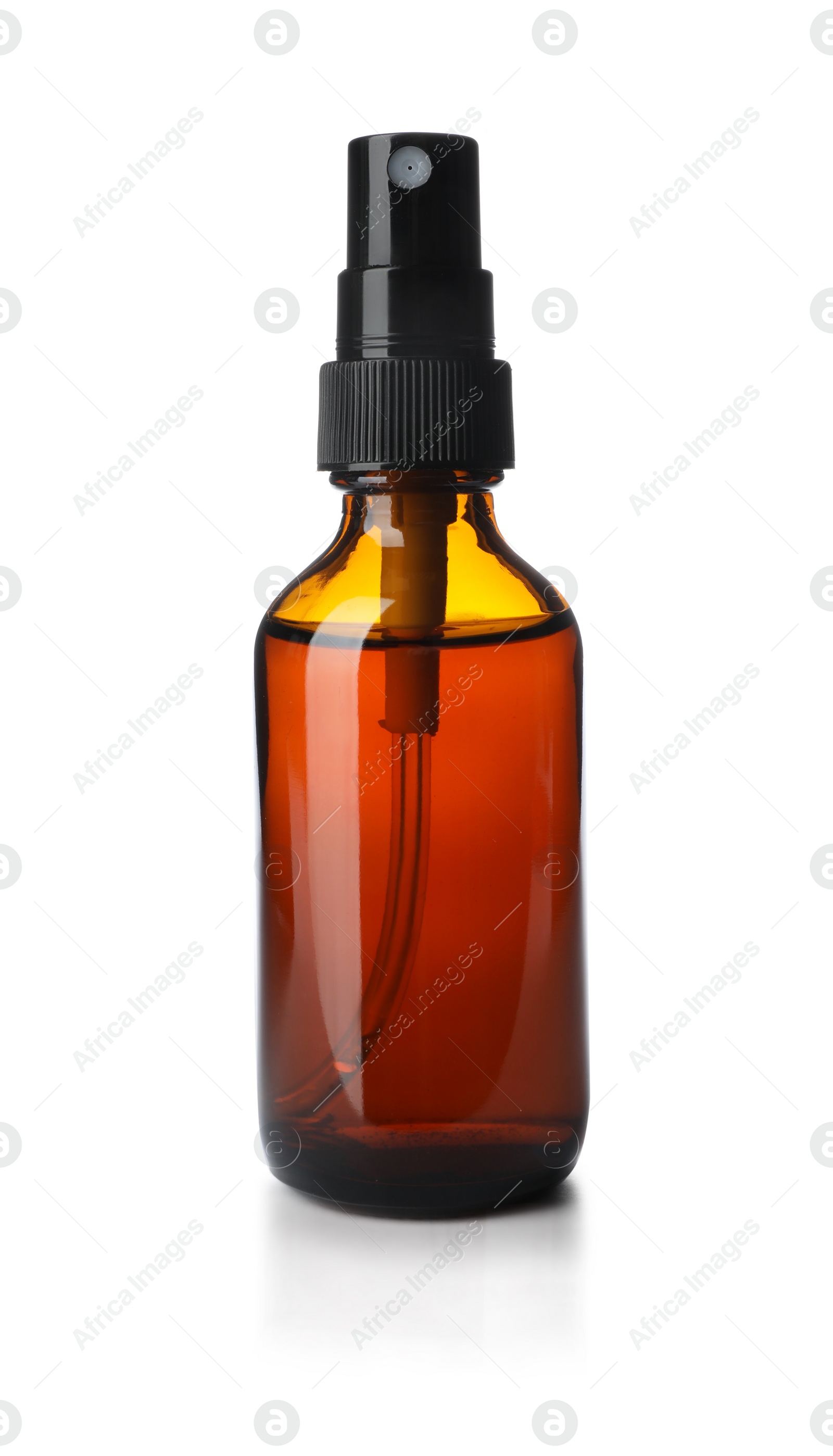 Photo of Bottle of essential oil isolated on white