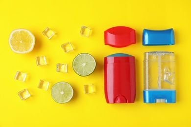 Flat lay composition with natural male deodorants on yellow background