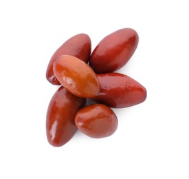 Photo of Heap of ripe red dates on white background, top view