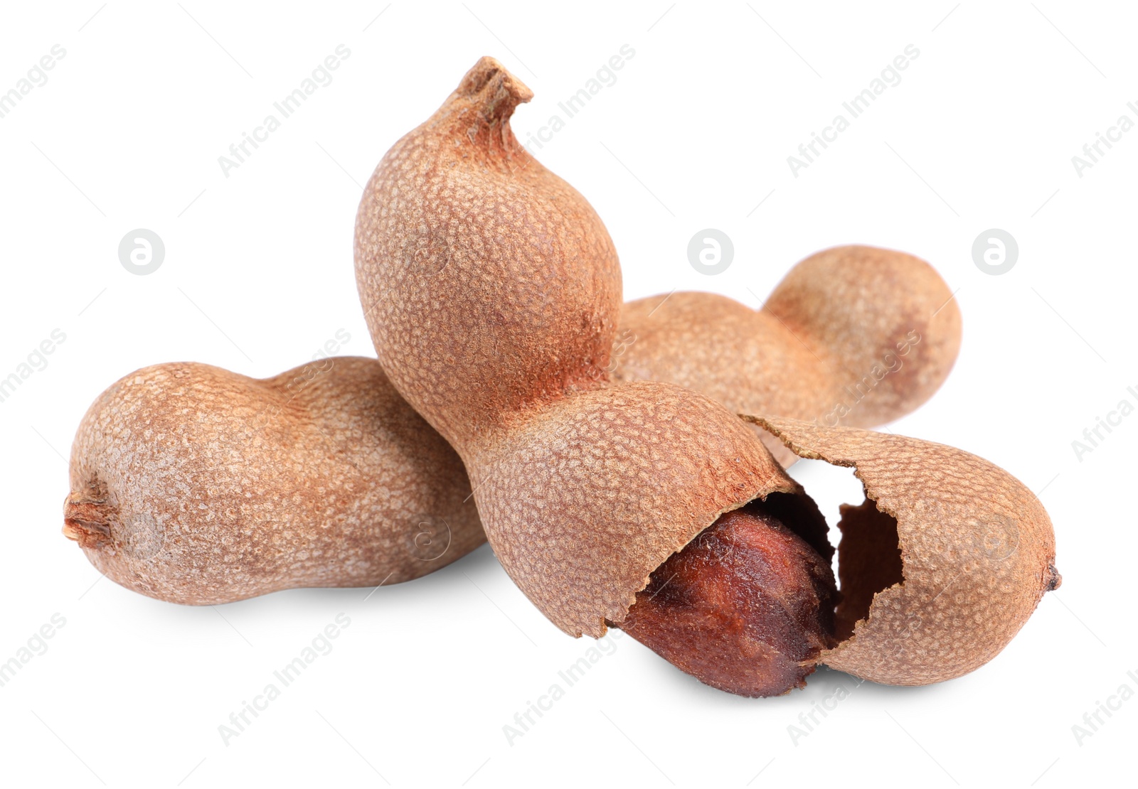 Photo of Delicious ripe tamarinds on white background. Exotic fruit