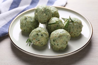 Photo of Tasty falafel balls on white wooden table, closeup. Vegan products