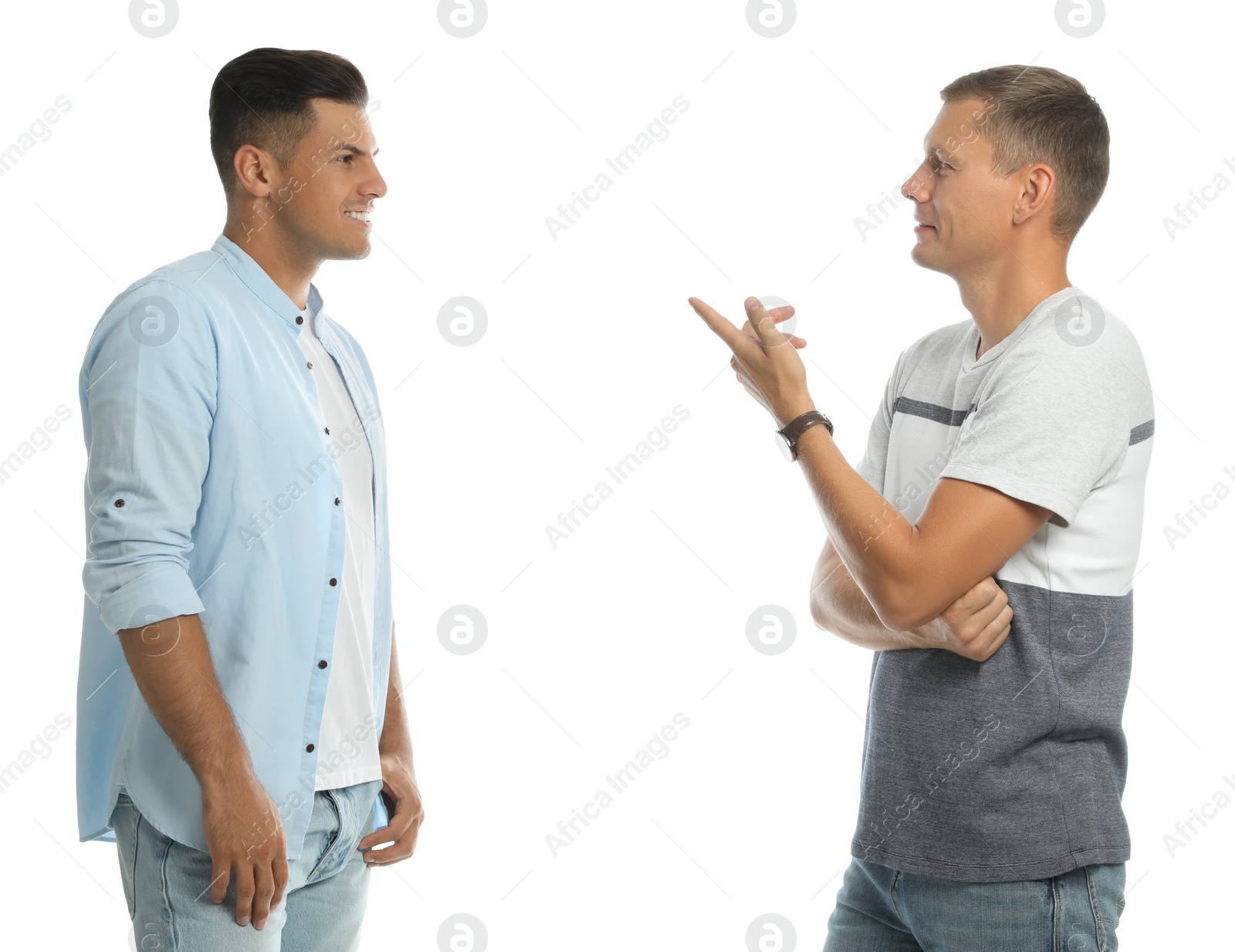 Photo of Men in casual clothes talking on white background