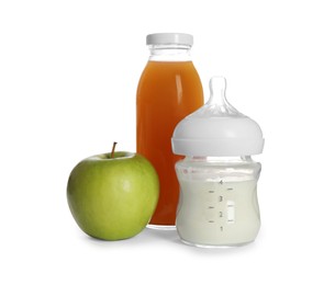 Photo of Bottles with juice, milk and apple isolated on white. Baby nutrition