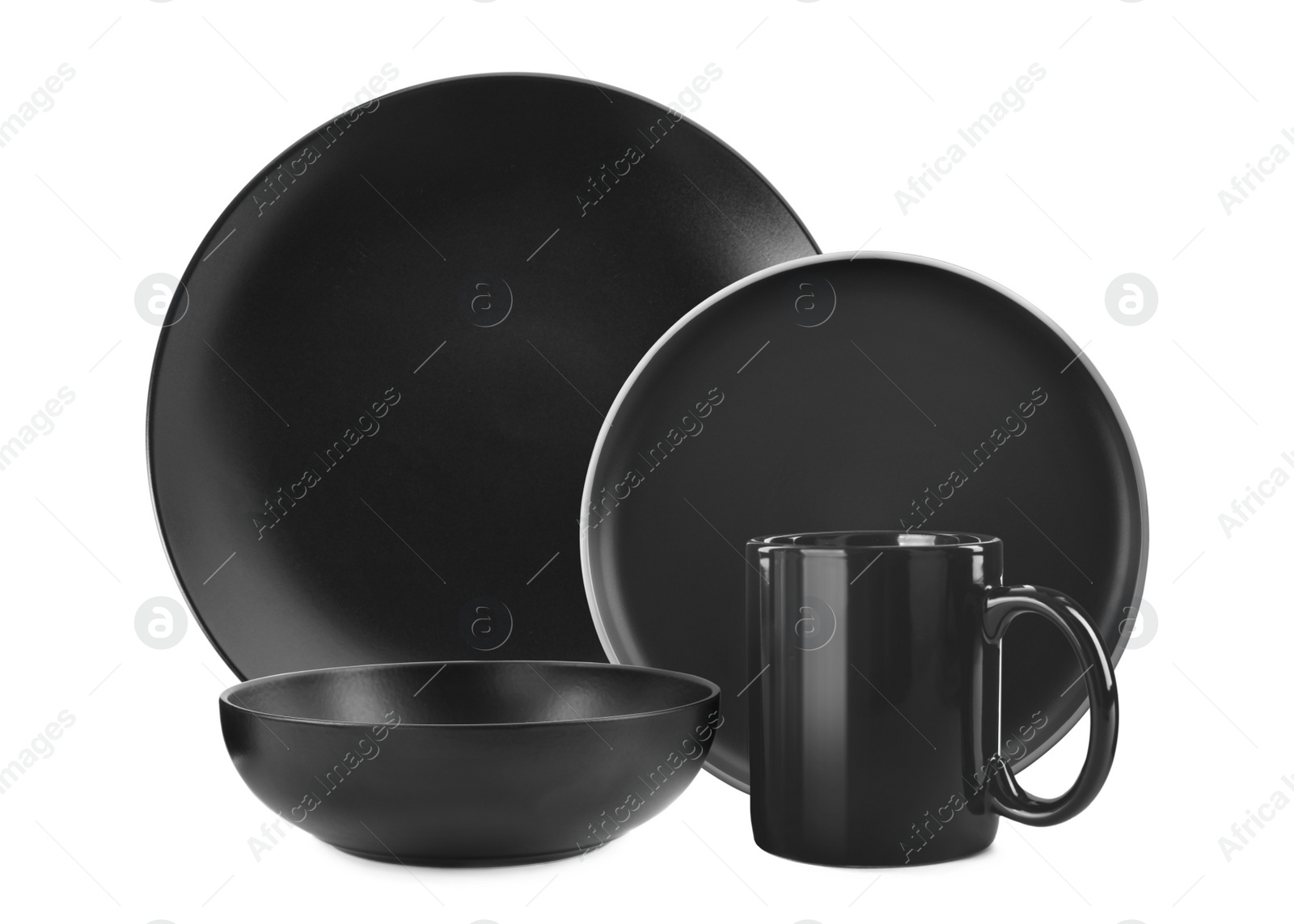 Image of Set of stylish black dinnerware on white background