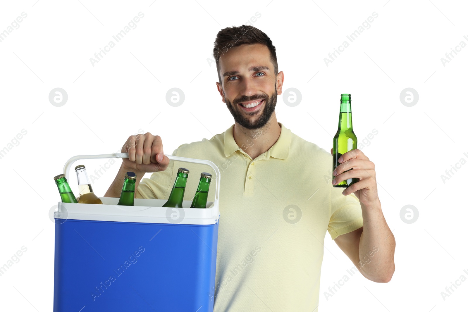 Photo of Happy man with cool box and bottles of beer on white background