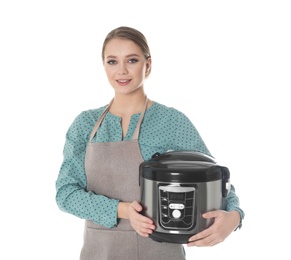 Photo of Portrait of young woman with modern multi cooker on white background