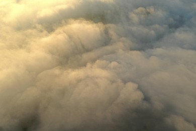 Photo of Aerial view of thick fog in morning. Drone photography
