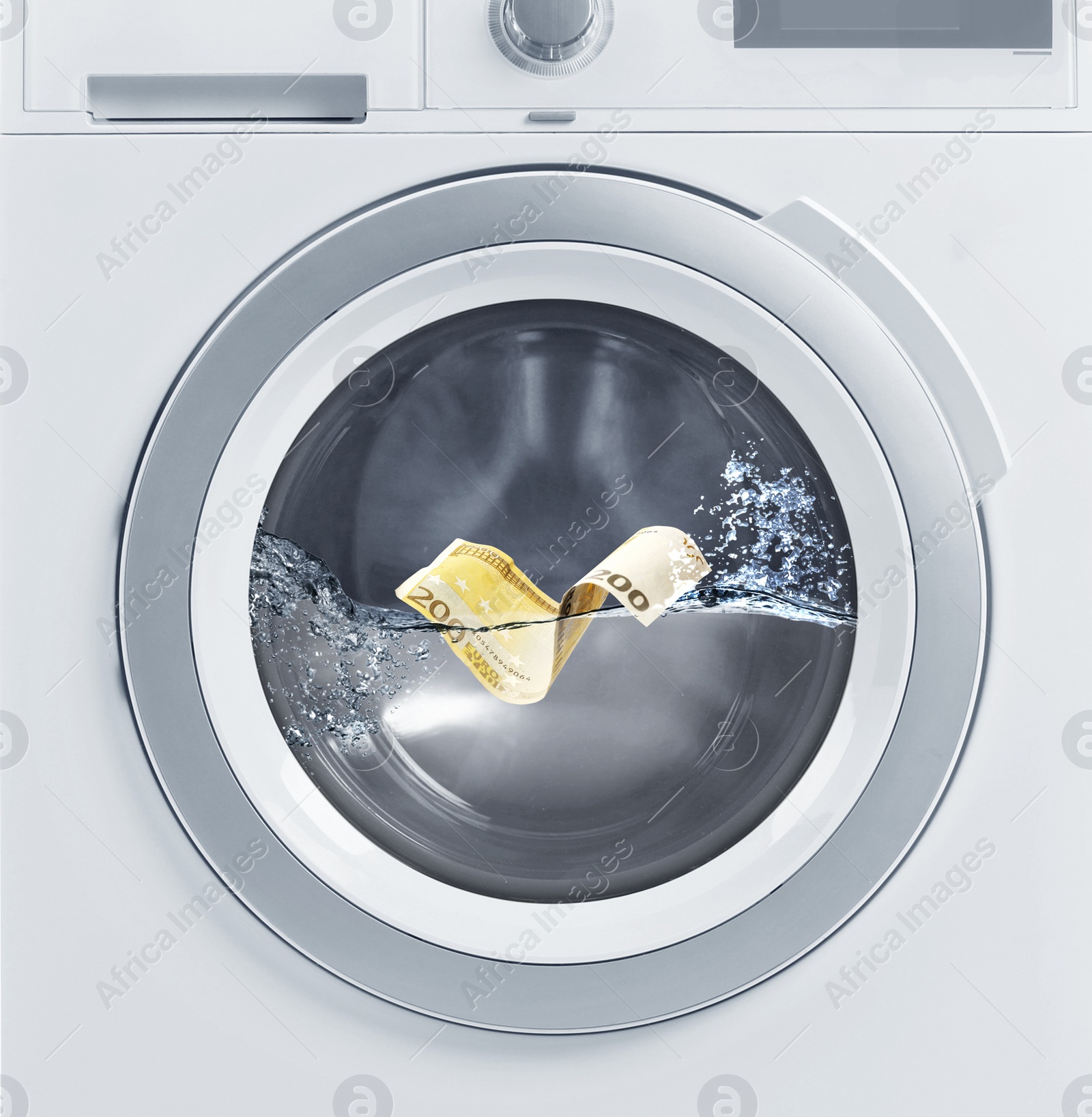 Image of Money laundering. Two hundred euro banknote in washing machine