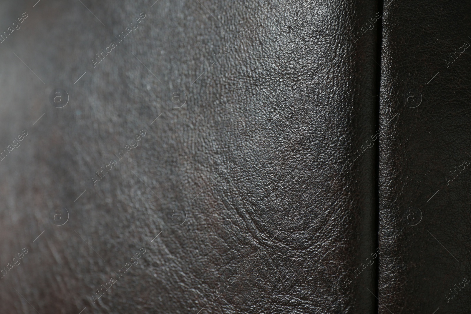 Photo of Texture of black leather as background, closeup
