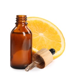 Photo of Bottle of citrus essential oil, pipette and fresh orange on white background