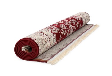 Photo of Rolled carpet with pattern on white background. Interior element