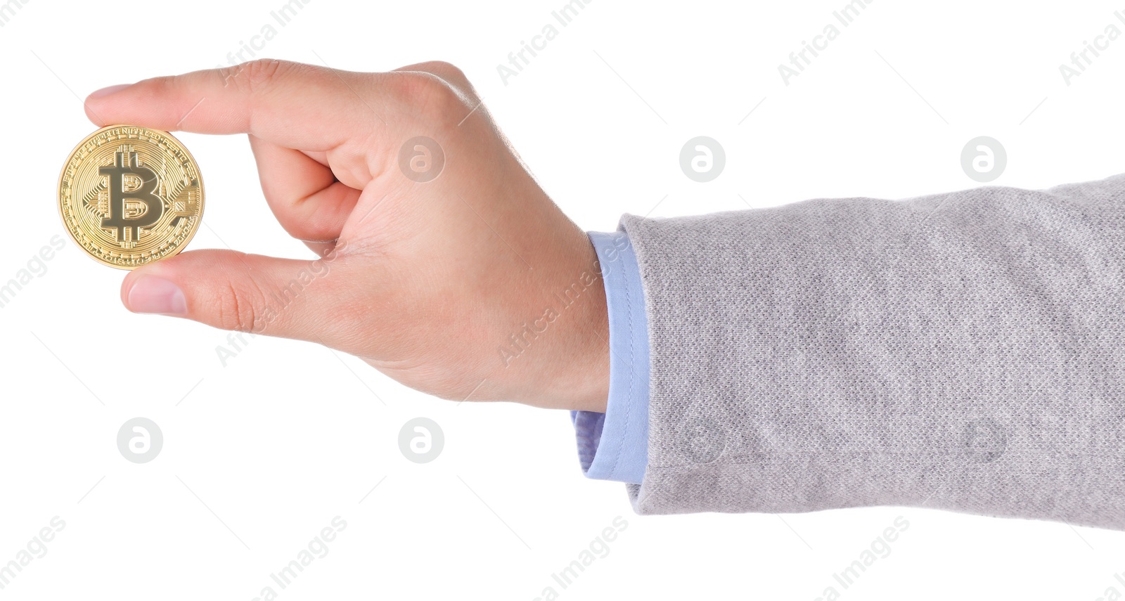 Photo of Man holding golden bitcoin on white background, closeup