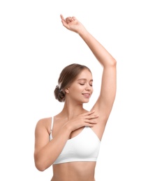 Photo of Young woman with smooth clean armpit on white background. Using deodorant