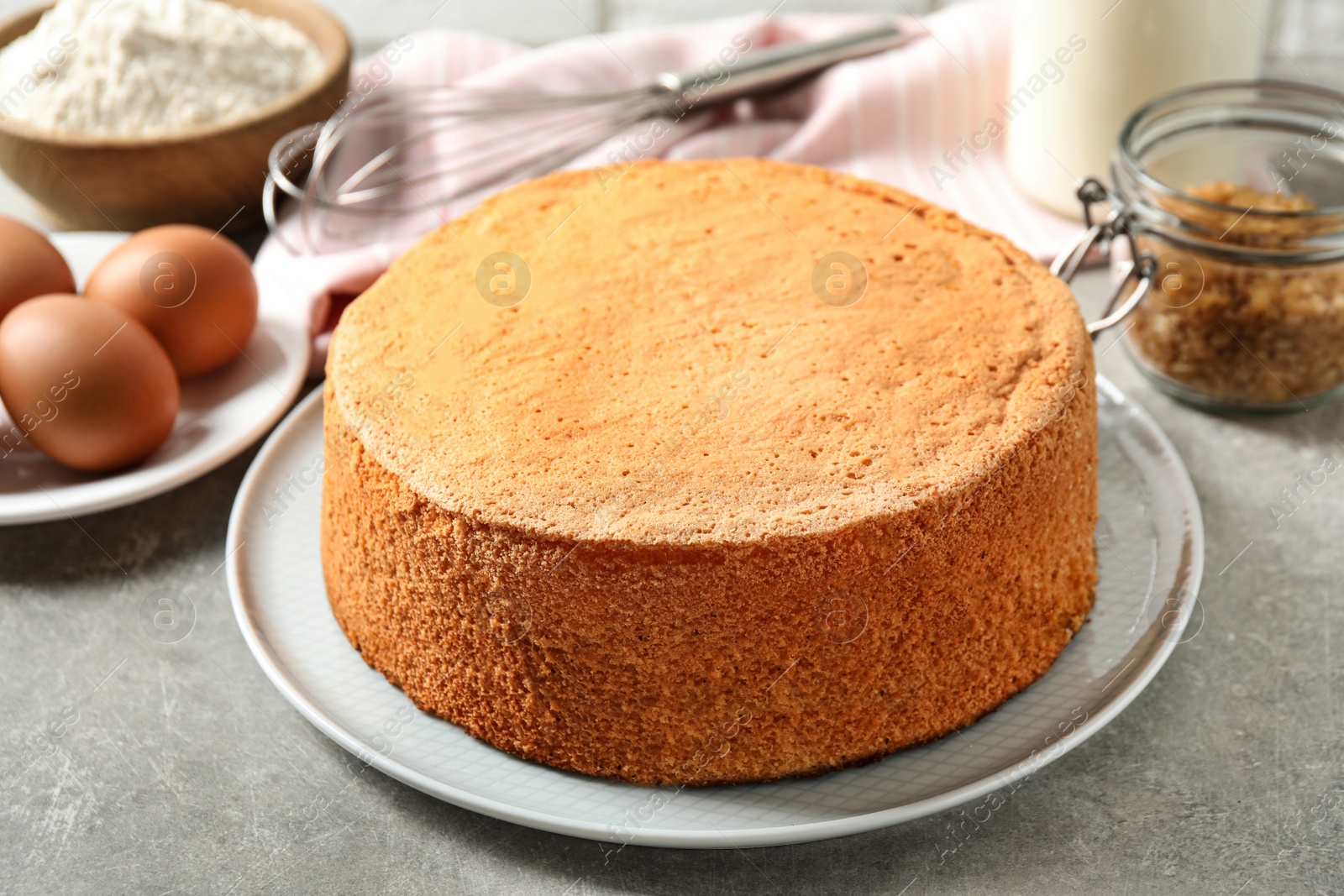 Photo of Delicious fresh homemade cake on light grey marble table