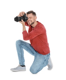 Photo of Male photographer with camera on white background