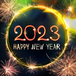 Image of Bright text Happy New 2023 Year made of firework on dark background. Greeting card design