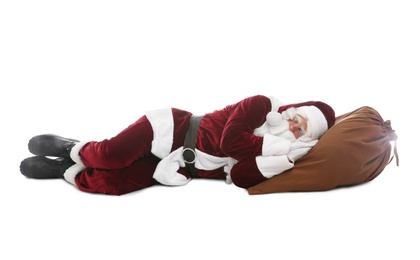Photo of Santa Claus sleeping on sack against white background