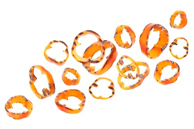 Image of Slices of grilled bell peppers in air on white background