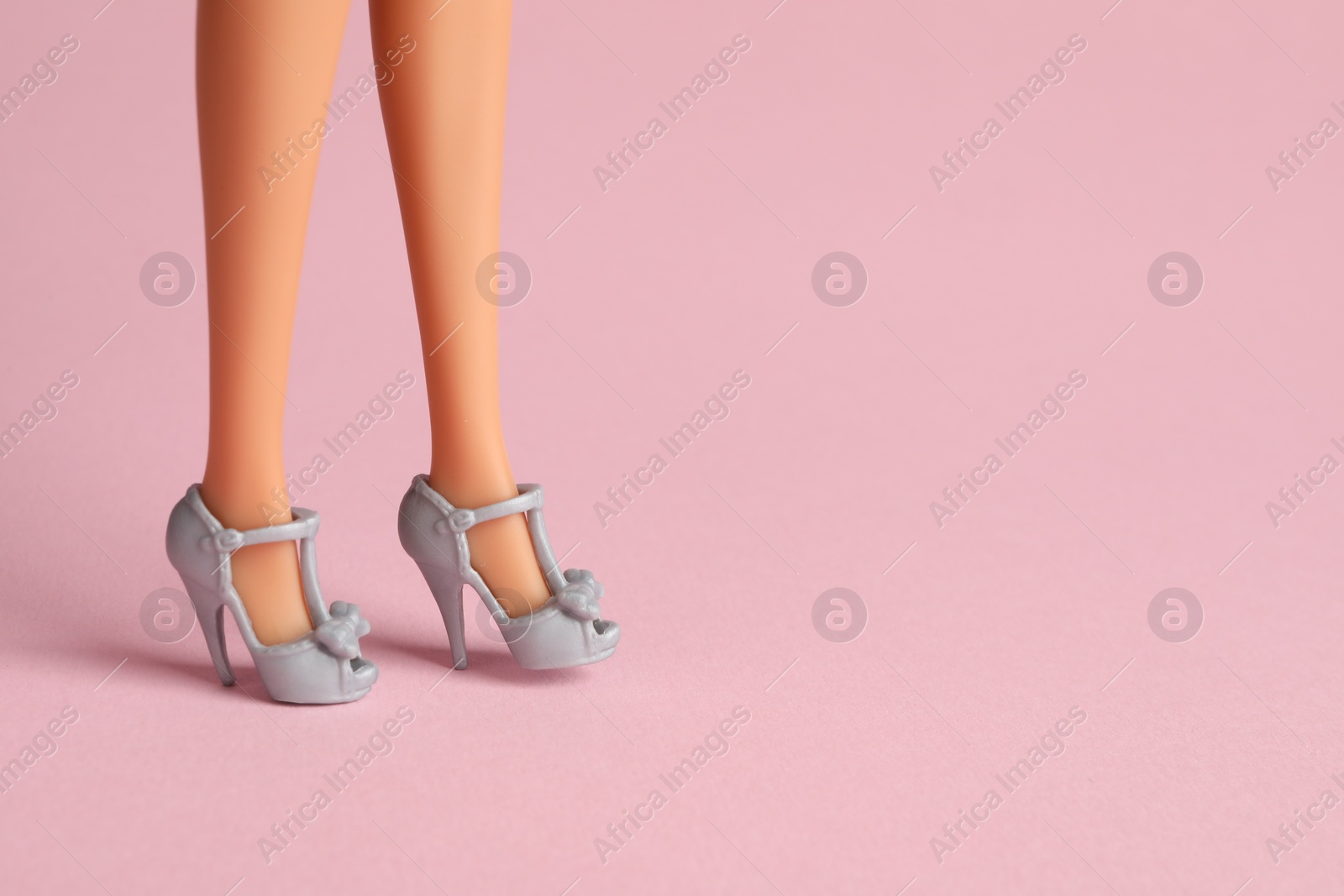 Photo of Mykolaiv, Ukraine - September 2, 2023 Barbie doll on pale pink background, closeup with space for text