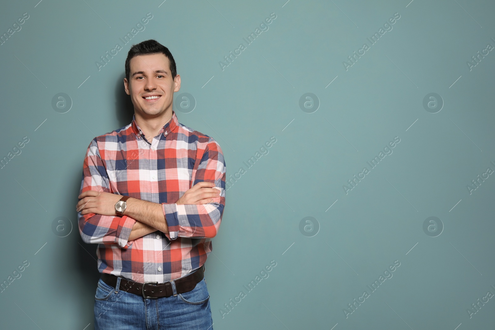 Photo of Portrait of confident man on color background