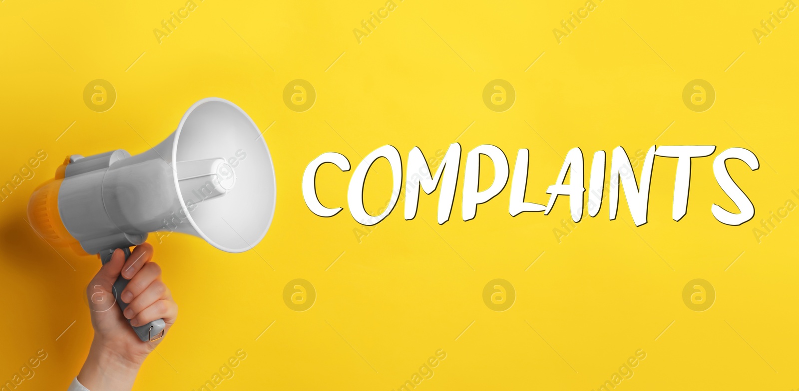 Image of Man holding megaphone on yellow background, closeup. Word Complaints coming out from device. Banner design