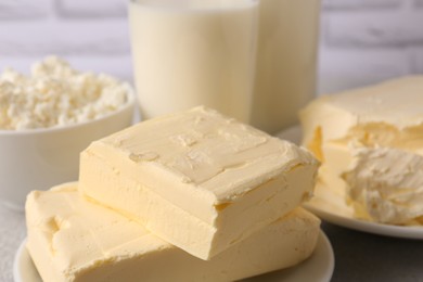 Tasty homemade butter and dairy products on table, closeup